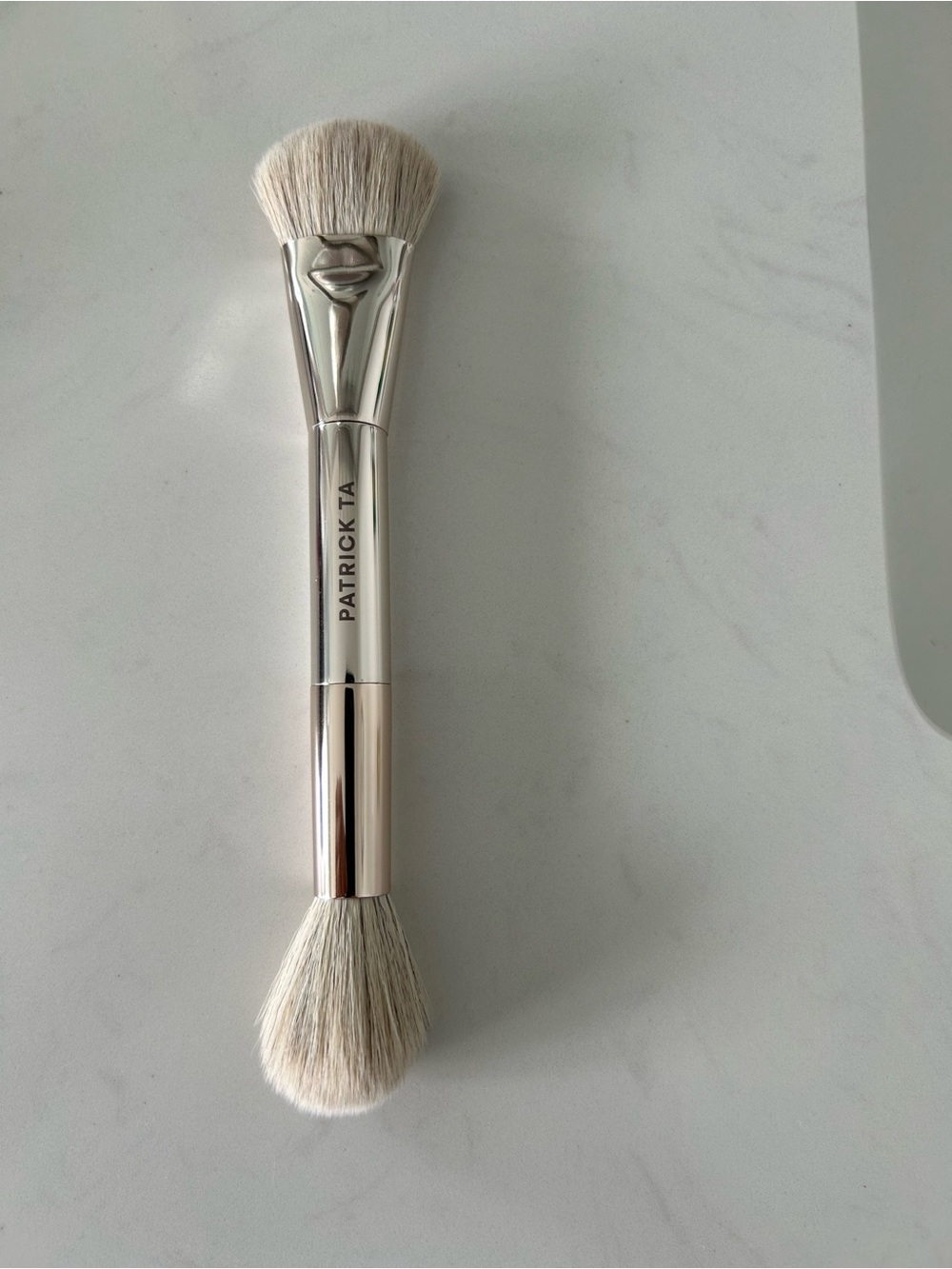 Patrick Ta Dual-Ended Face Brush in Metallic Silver with Cream Bristles